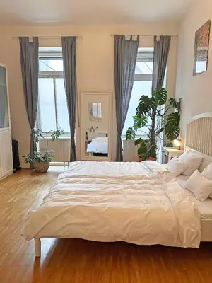 Ein Bett oder Betten in einem Zimmer der Unterkunft Mediterrane EG-Wohnung / BASF-Nähe / 650mbit WLAN