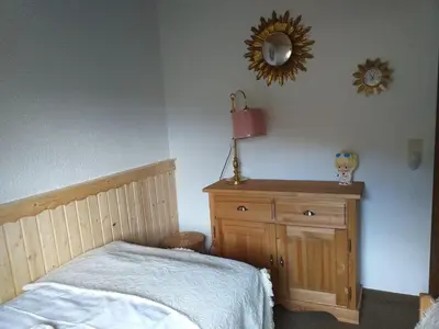 Ein Bett oder Betten in einem Zimmer der Unterkunft Ferienwohnungen Tannenhof