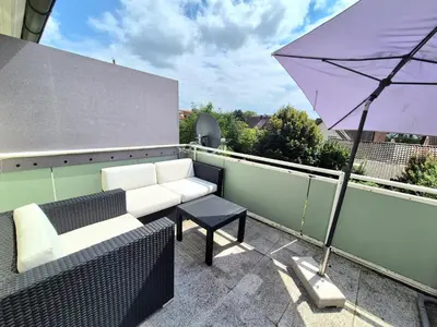 Ein Balkon oder eine Terrasse in der Unterkunft Ferienwohnung Grünoase mit Sonnenbalkon