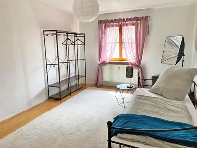 Ein Bett oder Betten in einem Zimmer der Unterkunft Ferienwohnung Sankt Martin 225 N.N.