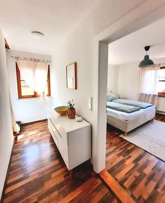 Ein Bett oder Betten in einem Zimmer der Unterkunft Ferienwohnung Sankt Martin 225 N.N.