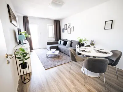Ein Sitzbereich in der Unterkunft City Suite - 5 Min to HBF