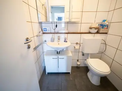 Ein Badezimmer in der Unterkunft City Suite - 5 Min to HBF