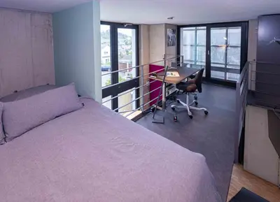 Ein Bett oder Betten in einem Zimmer der Unterkunft Fancy Loft mit Traumblick