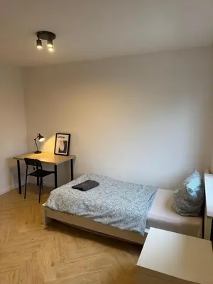 Ein Bett oder Betten in einem Zimmer der Unterkunft Apartment Lutherbaum