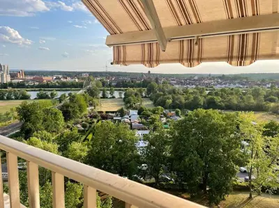 Ein Balkon oder eine Terrasse in der Unterkunft Charmante Ferienwohnung mit Klimaanlage !