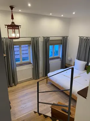 Ein Bett oder Betten in einem Zimmer der Unterkunft Marktblick-Besigheim