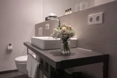 Ein Badezimmer in der Unterkunft Suytes