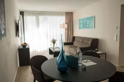 Ein Sitzbereich in der Unterkunft Suytes