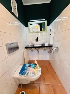 Ein Badezimmer in der Unterkunft Workers Lodge für 4-14 Pers, Parkplatz, Wlan, Einzelbetten