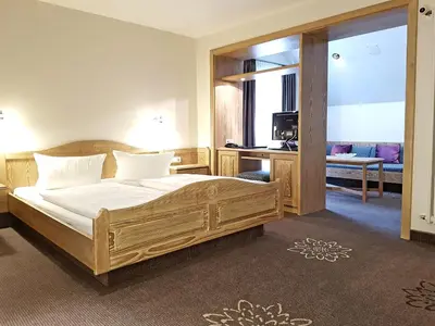 Ein Bett oder Betten in einem Zimmer der Unterkunft Hotel in den Herrnwiesen