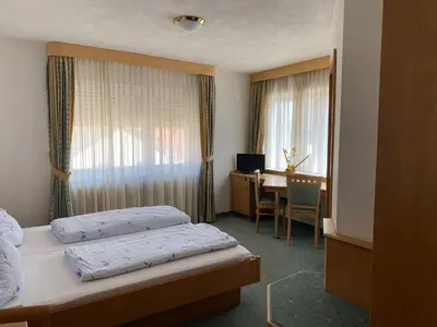 Ein Bett oder Betten in einem Zimmer der Unterkunft Landgasthaus zum Hirsch