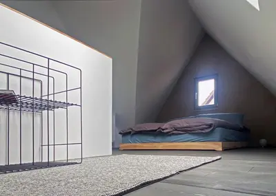 Ein Bett oder Betten in einem Zimmer der Unterkunft ZUM SCHOCKELGAUL Ein Pfalzjuwel in Forst ! Weinberge und Pfälzer Wald vor der Haustür ! Etliche Restaurants und Weingüter 1-5 min