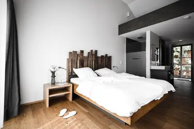 Ein Bett oder Betten in einem Zimmer der Unterkunft Der espenhof Landhotel, Tagungshotel & Weingut