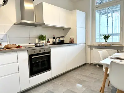Küche/Küchenzeile in der Unterkunft MyStay I Central Lofts I Superior Design Apartments Heidelberg