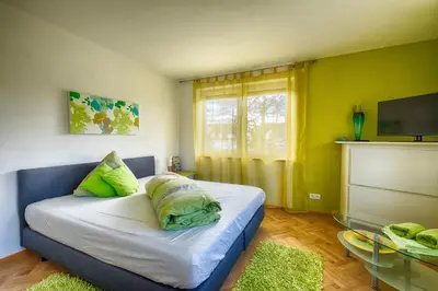 Ein Bett oder Betten in einem Zimmer der Unterkunft Pension Weinsberger Tal