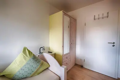 Ein Bett oder Betten in einem Zimmer der Unterkunft Pension Weinsberger Tal