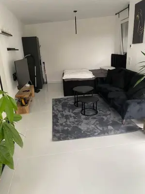 Ein Sitzbereich in der Unterkunft Stilvolle 1-Zimmer Wohnung mit Terasse nahe Therme und Prezero Arena