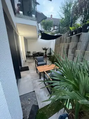 Ein Sitzbereich in der Unterkunft Stilvolle 1-Zimmer Wohnung mit Terasse nahe Therme und Prezero Arena
