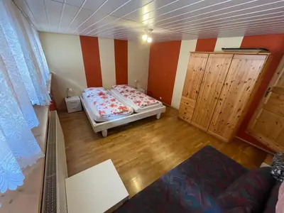 Ein Bett oder Betten in einem Zimmer der Unterkunft Weingut und Destillerie Bernd Klein