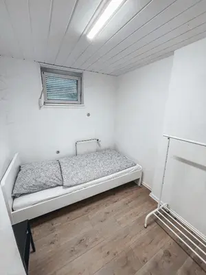Ein Bett oder Betten in einem Zimmer der Unterkunft Unterkunft SL