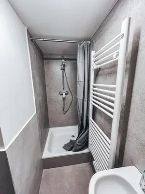 Ein Badezimmer in der Unterkunft Unterkunft SL