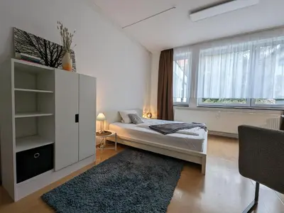 Ein Bett oder Betten in einem Zimmer der Unterkunft Pension am Park