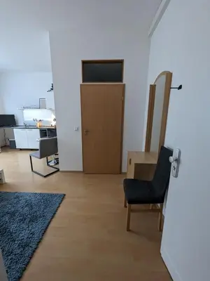 Ein Sitzbereich in der Unterkunft Pension am Park