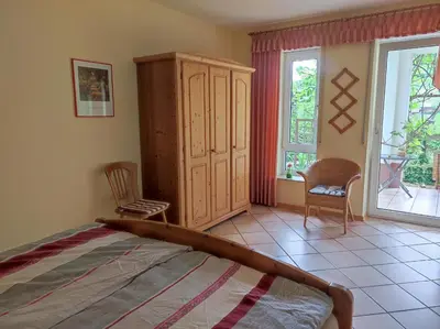 Ein Bett oder Betten in einem Zimmer der Unterkunft Ferienwohnung 