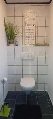 Ein Badezimmer in der Unterkunft FeWo Blaue Oase, Netflix, Massagesessel, Whirlpool Badewanne