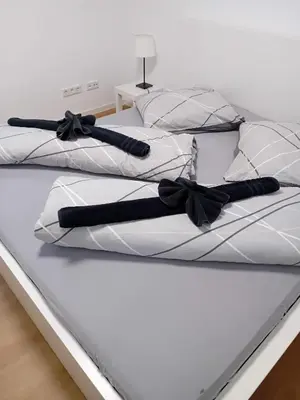 Ein Bett oder Betten in einem Zimmer der Unterkunft ~Ferienwohnung Sandhausen / HD~
