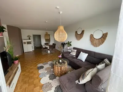Ein Sitzbereich in der Unterkunft Ferienwohnung in Maikammer