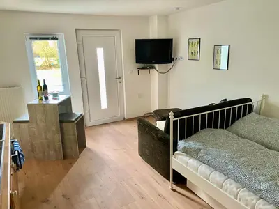 Ein Bett oder Betten in einem Zimmer der Unterkunft Engelhard´s Ferien Apartment