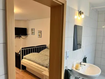 Ein Bett oder Betten in einem Zimmer der Unterkunft Engelhard´s Ferien Apartment