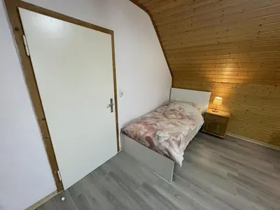 Ein Bett oder Betten in einem Zimmer der Unterkunft Schicke Ferien- und Monteurswohnung 53 qm Philippsburg