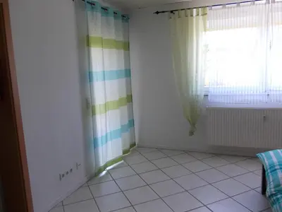 Ein Bett oder Betten in einem Zimmer der Unterkunft Ferienwohnung Knobloch