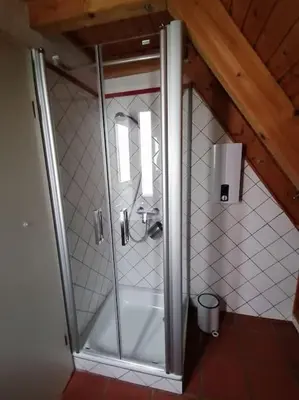 Ein Badezimmer in der Unterkunft Traumblick Rebenmeer