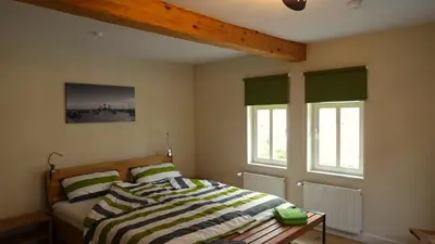Ein Bett oder Betten in einem Zimmer der Unterkunft Das Schindelhaus