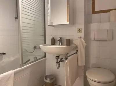 Ein Badezimmer in der Unterkunft Hübsche Wohnung mit Balkon für 1-2 Personen - Einzelbetten