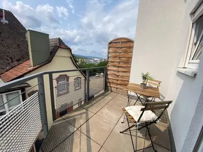 Ein Balkon oder eine Terrasse in der Unterkunft Hübsche Wohnung mit Balkon für 1-2 Personen - Einzelbetten