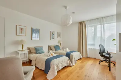 Ein Bett oder Betten in einem Zimmer der Unterkunft Exklusive Villa-Eggert mit Kamin & Terasse für 6 Personen im Bretten