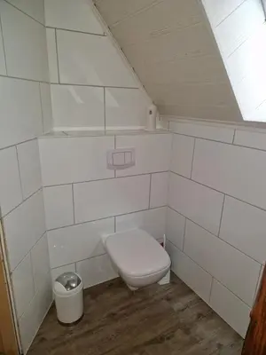 Ein Badezimmer in der Unterkunft Ferienwohnung Blumenshein bei Speyer Karlsruhe Familienfreundlich 5 Pers