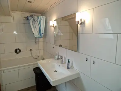 Ein Badezimmer in der Unterkunft Ferienwohnung Blumenshein bei Speyer Karlsruhe Familienfreundlich 5 Pers
