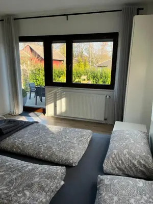 Ein Bett oder Betten in einem Zimmer der Unterkunft Stilvolles Apartment nahe Therme und PreZero Arena