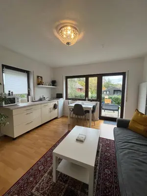 Ein Sitzbereich in der Unterkunft Stilvolles Apartment nahe Therme und PreZero Arena