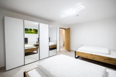 Ein Bett oder Betten in einem Zimmer der Unterkunft Hotel Talblick