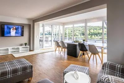 TV/Unterhaltungsangebot in der Unterkunft Stadthaus Neckarsulm serviced apartments – Penthouse Erlenbach