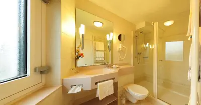 Ein Badezimmer in der Unterkunft Hotel Alte Post Garni