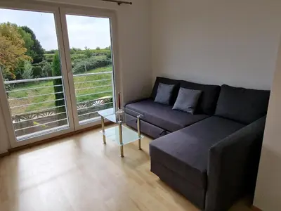 Ein Sitzbereich in der Unterkunft Ferienwohnung Rosenblüte