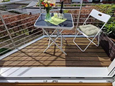 Ein Balkon oder eine Terrasse in der Unterkunft Ferienwohnung Rosenblüte